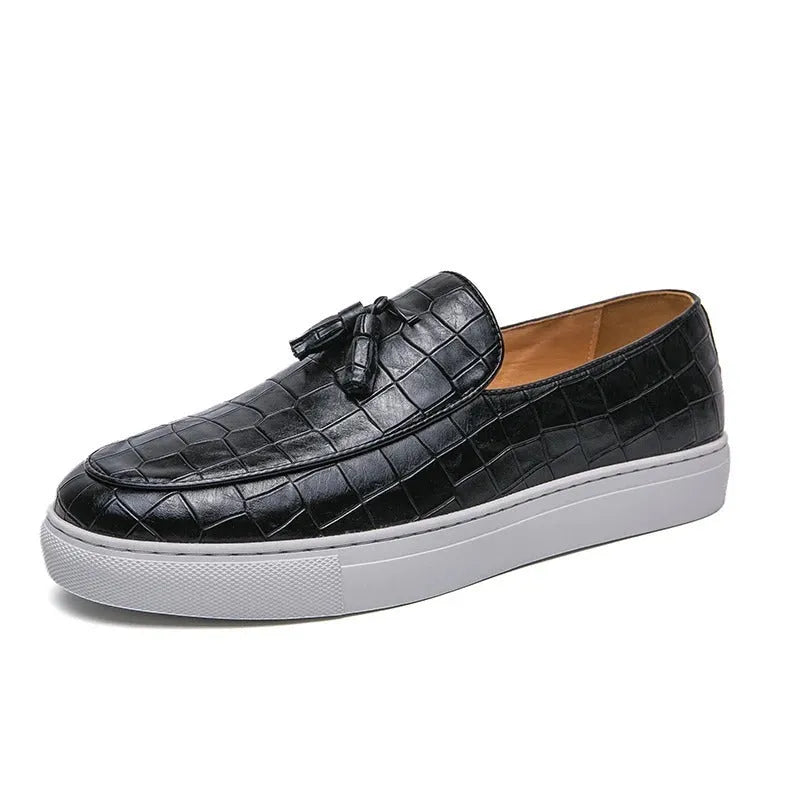 Men's black sneakers with tassel detailing, round toe, and rubber sole for business casual settings