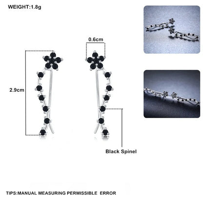 Women's long fringed zircon earrings in black with flower details and secure backing