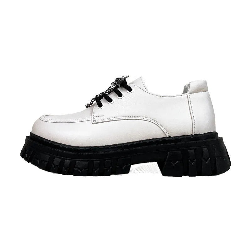 Women's Duke Asterism preppy loafers with a round toe and metal cross shoulder strap.