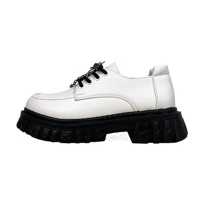 Women's Duke Asterism preppy loafers with a round toe and metal cross shoulder strap.