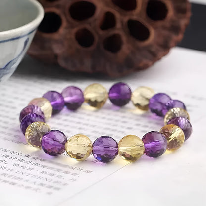 Handmade crystal bracelet with 128-cut gemstone beads and zodiac charm on wrist