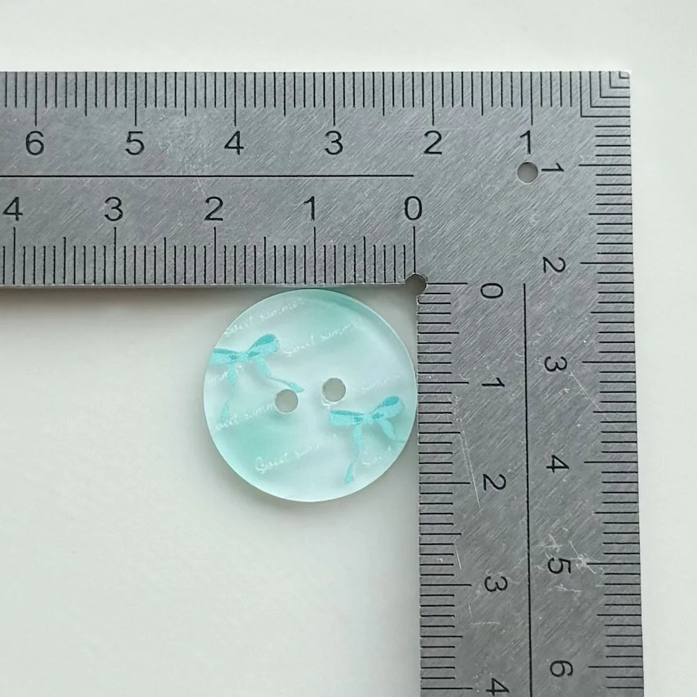 DIY acrylic button with cartoon plaid design measuring 2cm diameter for clothing customisation projects