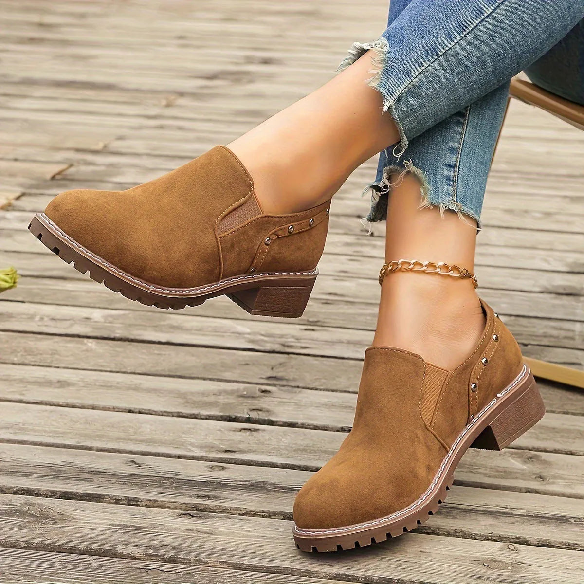 Light brown plus size women's suede ankle boots with a thick low heel and elastic band side closure.