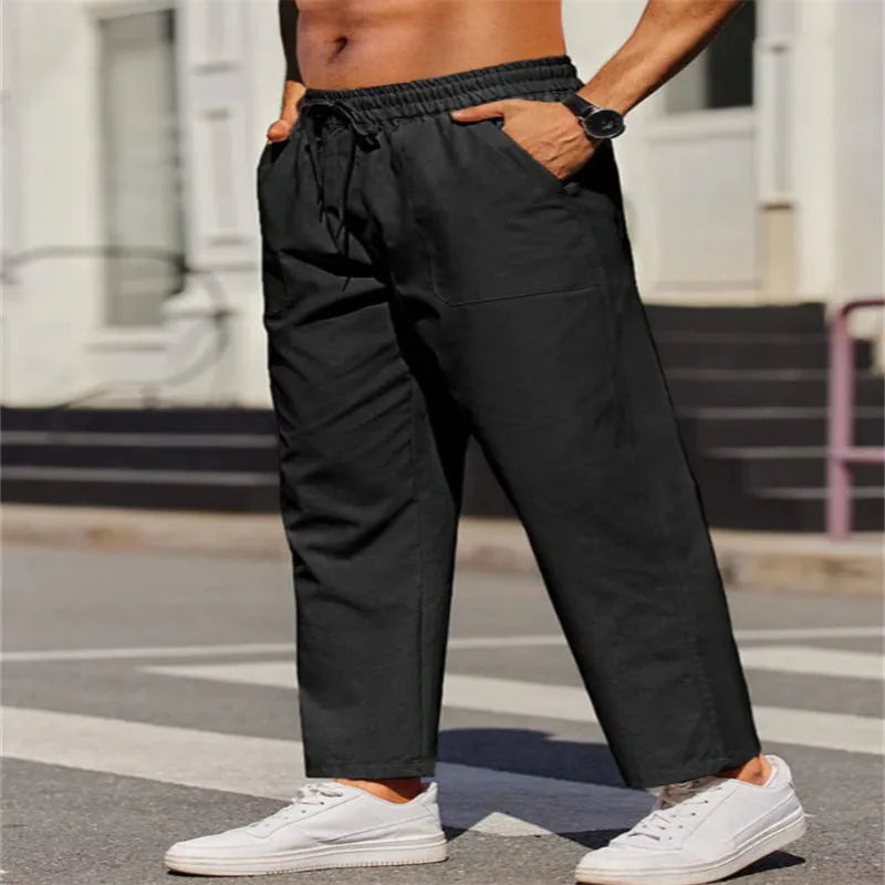 Men's straight-leg linen trousers in apricot colour with elastic waistband