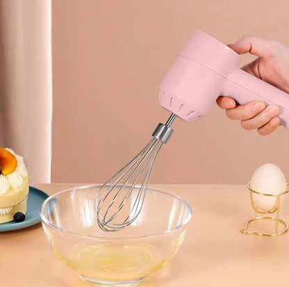 Cordless mini wireless electric hand mixer with whisk and beater attachments, available in green, white, and pink colors