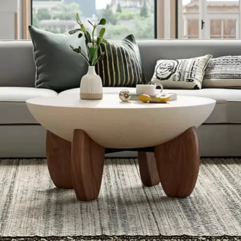 White solid wood coffee table with adjustable height and side storage compartment in living room setting