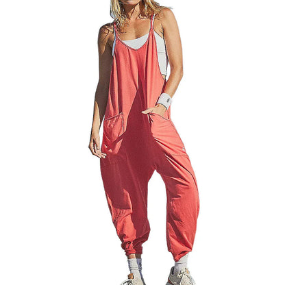 Sleeveless jumpsuit with spaghetti straps, pockets, and zipper closure in various colors