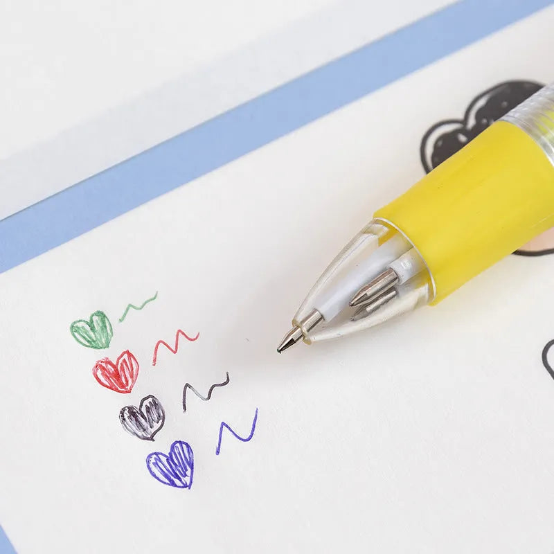 Cartoon-themed four-colour press ballpoint pen with 0.7mm tip showing random design selection