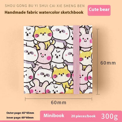 Feiluniao watercolour notebook with fabric cover, 185mm length, open to show paper for painting.