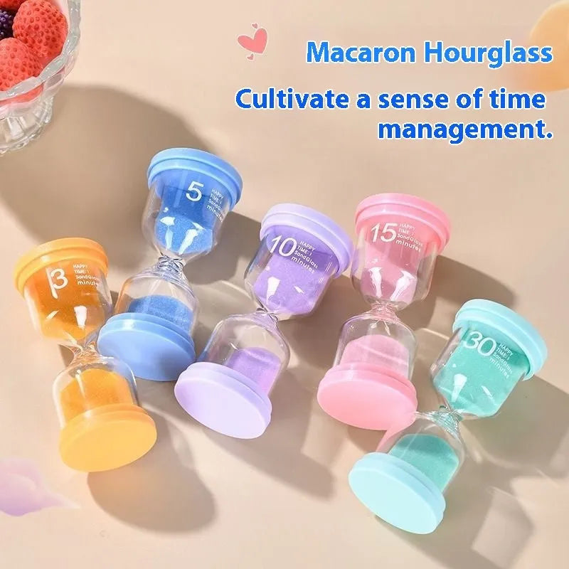 Glass sand timer with coloured quicksand in blue, green, pink, or purple options for 5-30 minute timing