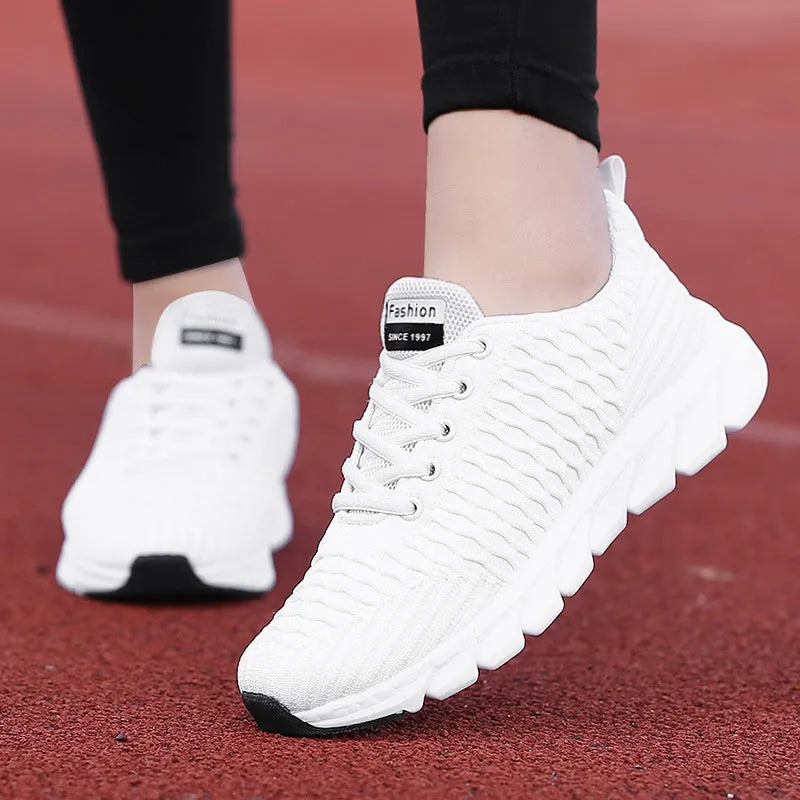 Women's running shoes with fly weaving upper material and wear-resistant outsole in black, pink, white colours