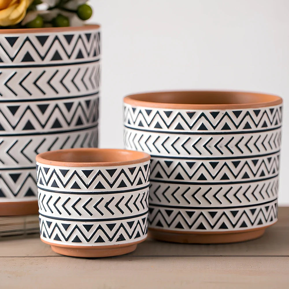 White ceramic geometric flower pot with Nordic design in three sizes for indoor plants