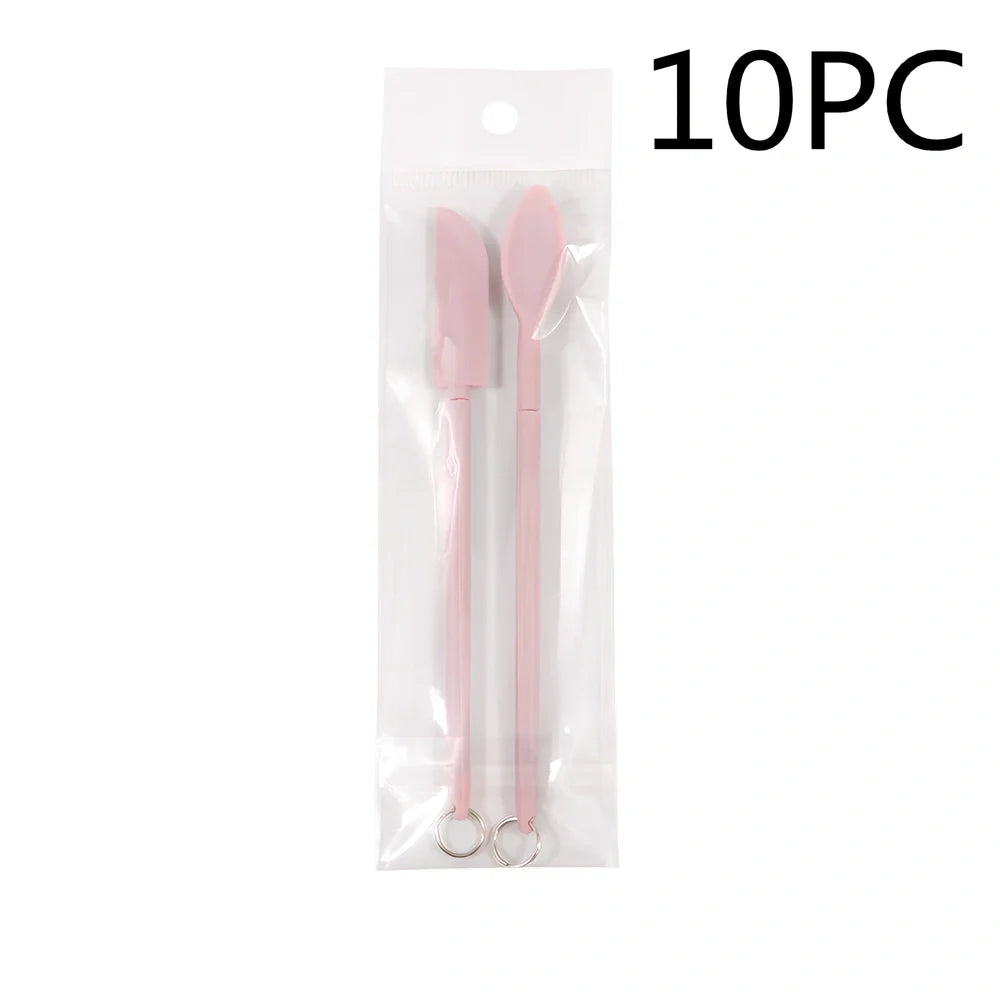 Retractable silicone cosmetic spatula extended to 15cm with scraper tool for product application