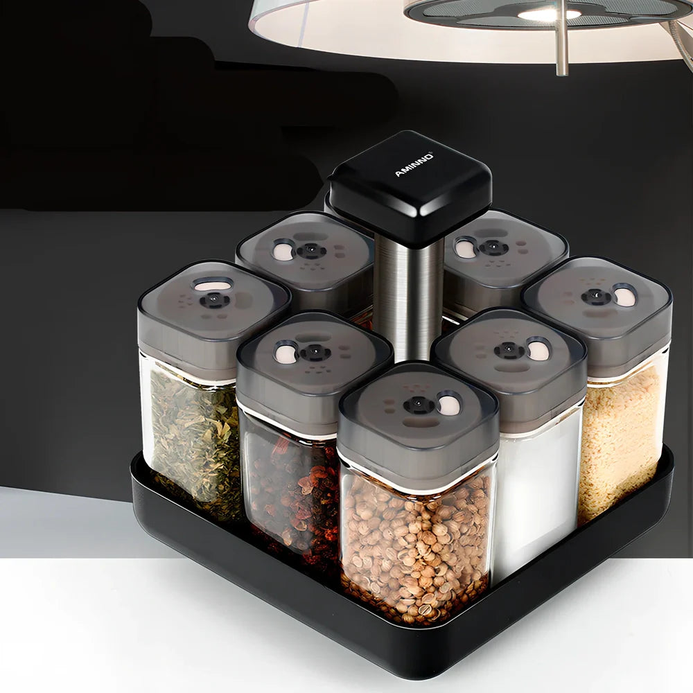 Six clear glass spice jars with natural bamboo lids in stackable configuration