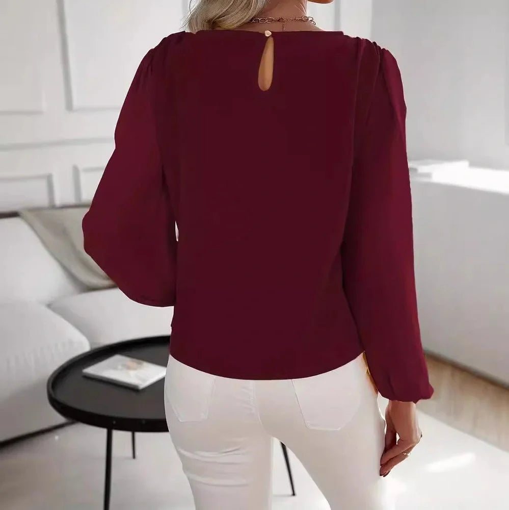 Wine red polyester long sleeve pullover top with button detailing on front, regular fit for commuting wear