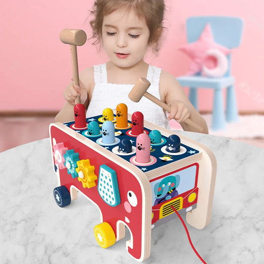 Wooden pounding bench toy with vibrant animal designs, promoting hand-eye coordination and creativity for toddlers and kids