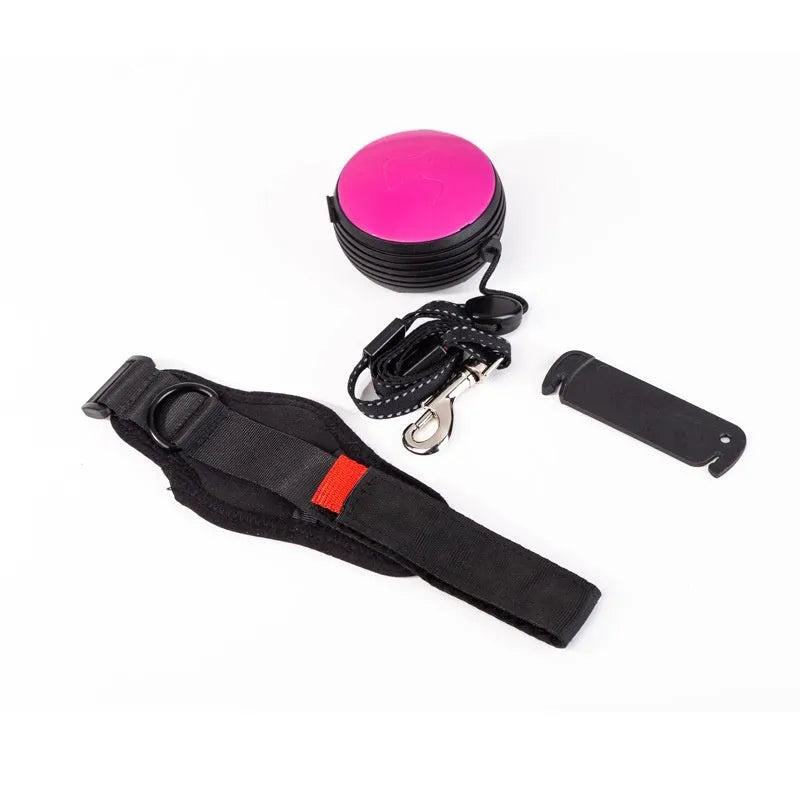 Automatic retractable dog leash extended to 3 metres with a lock button, shown in vibrant orange.