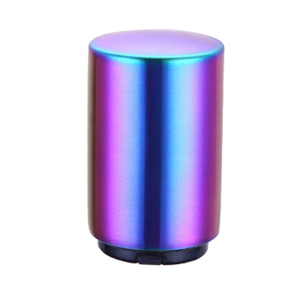 Stainless steel automatic press bottle opener with titanium-plated finish showing press mechanism and textured handle