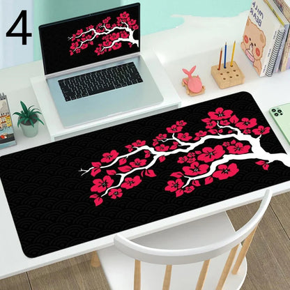 Large gaming mouse desk mat showing printed design on rubber surface with size options up to 400x900mm