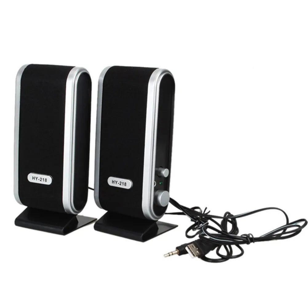 Black compact USB notebook mini speaker for laptop and computer audio enhancement.