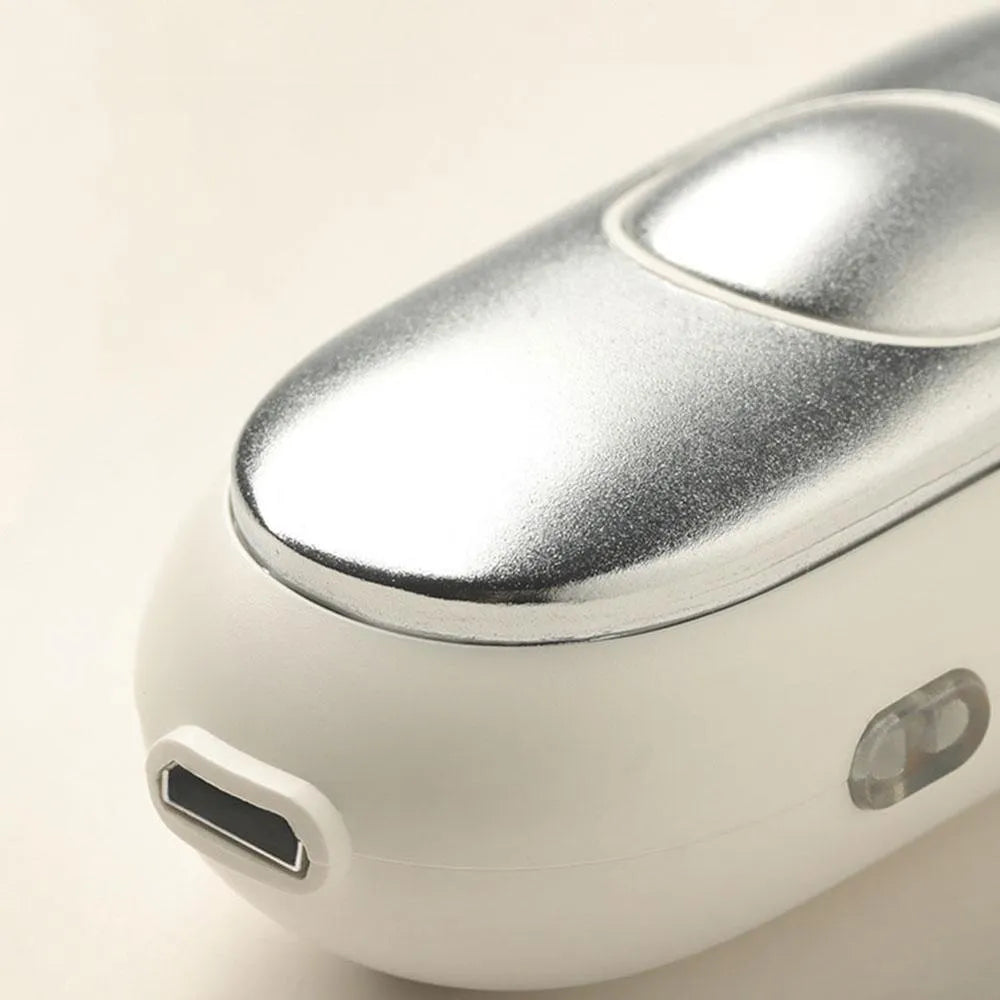 Hand-held micro-current sleep aid device in grey, green, and orange colour options