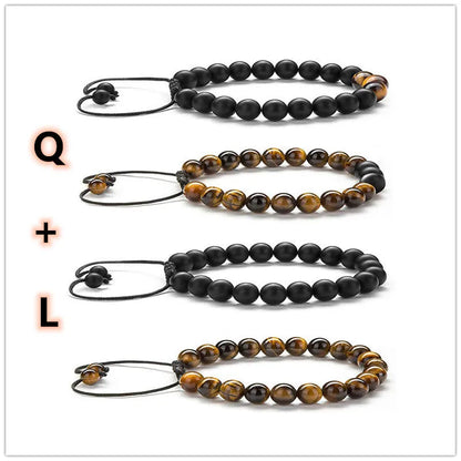 Tiger Eye and black agate geometric couple bracelets laid out as a matching set.