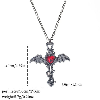 Gothic style zinc alloy necklace with bat pendant on a silver chain against dark background.