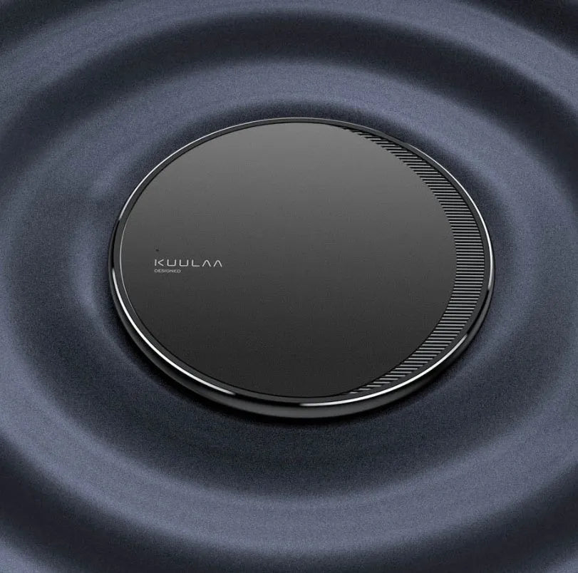 Black Kuulaa KL-CD16 wireless disc charger for mobile phones on a surface.