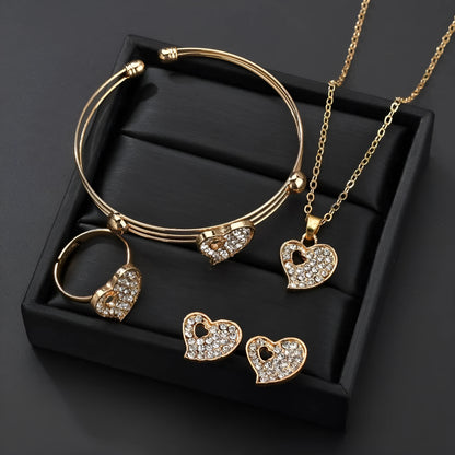 Gold-coloured women's love jewellery set with earrings, pendant and bracelet featuring bell patterns
