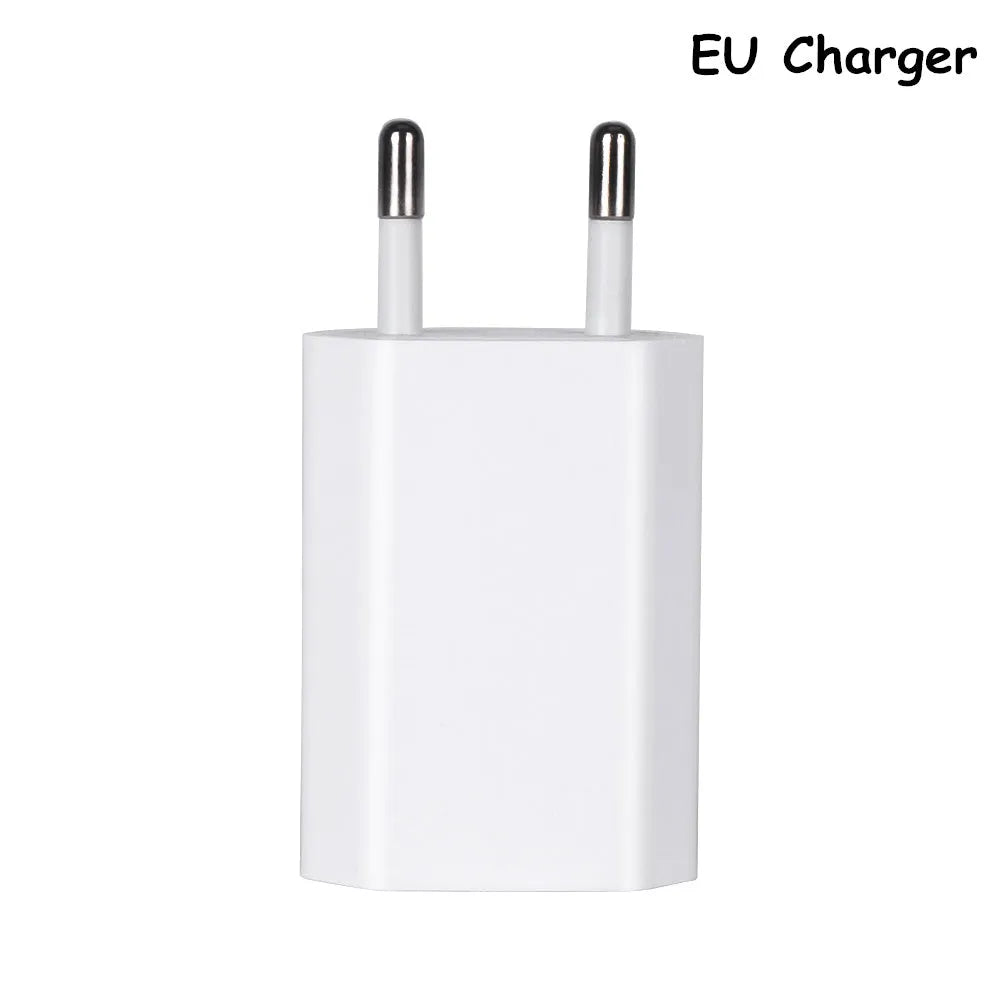 White USB wall charger with UK plug and a white Lightning cable for iPhone and iPad charging