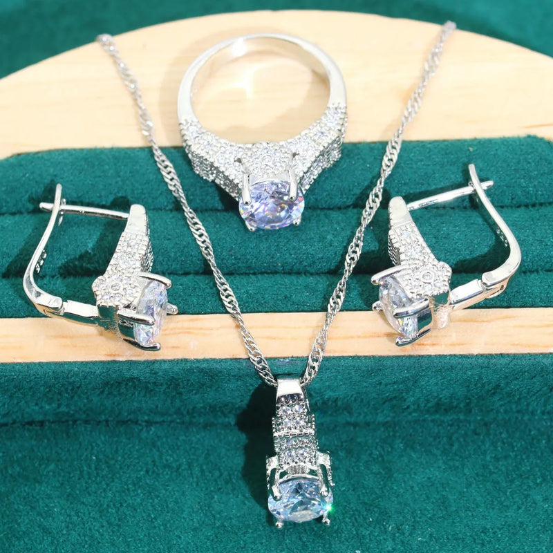 Bridal jewellery set with zircon pendant necklace, bracelet, earrings and ring in four-piece pack for wedding dress accessories, available in white, green, yellow or black colour with choice of alloy chain lengths from 6 to 10 yards.