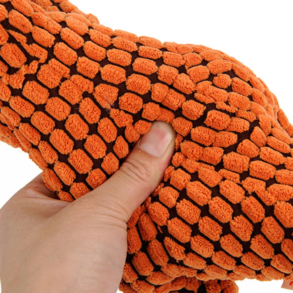 Durable dinosaur-shaped chew toys made of soft, high-quality materials for large dogs to play with and chew on