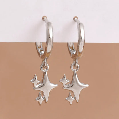 Small star-shaped copper earrings for women in gold or silver, supplied as one pair