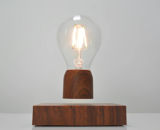 Magnetic levitation bulb floating above imitation wood base with international plug options