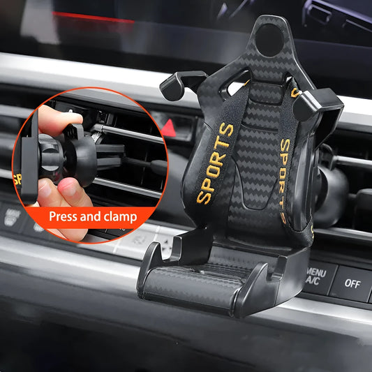 Gold car air vent phone holder with 360-degree rotation and silicone padding mounted on vehicle vent