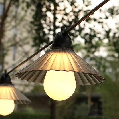 Outdoor LED string lights with flower-shaped bulbs in warm white or multicolour options