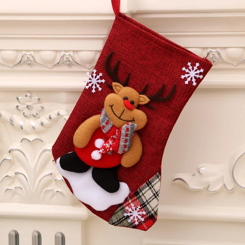 Multicolour Christmas hanging socks and gift bag with old man, snowman, deer, and bear designs