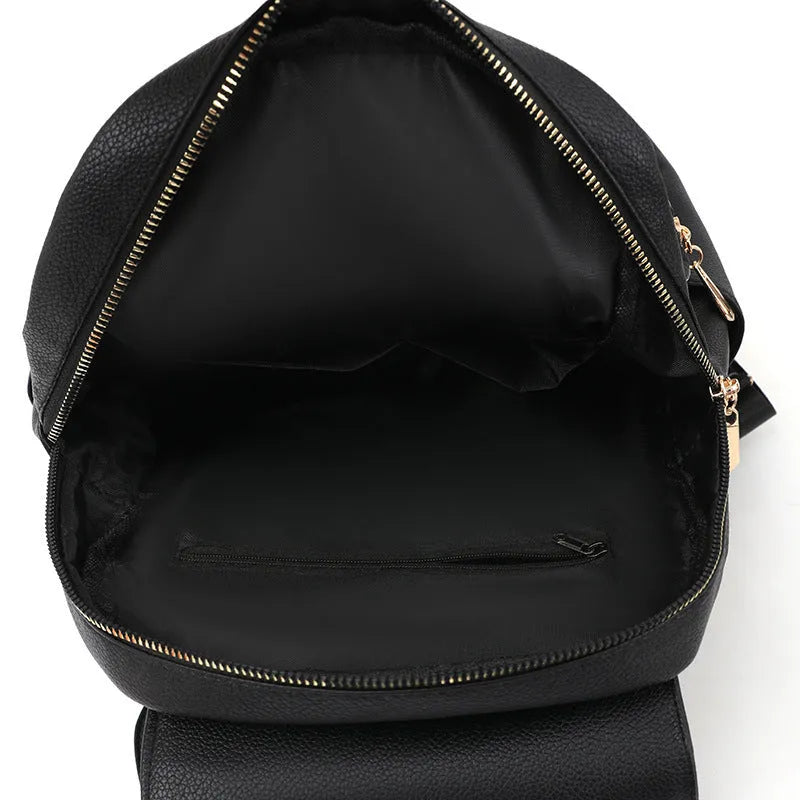 Casual black PU leather women's backpack with a three-dimensional front pocket and street style design.