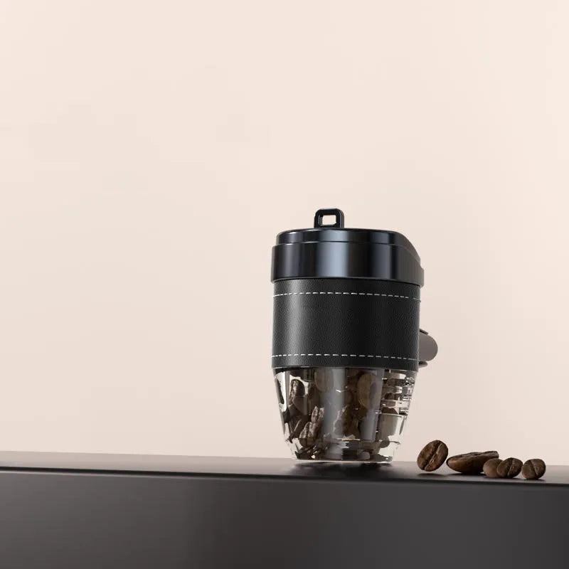 Brown plastic coffee cup-shaped solid car air freshener for dashboard odour removal.