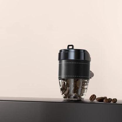 Brown plastic coffee cup-shaped solid car air freshener for dashboard odour removal.