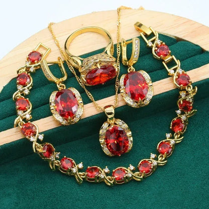Olive green zircon jewellery suit set showing necklace with snake bone chain, matching earrings, and ring on a display.