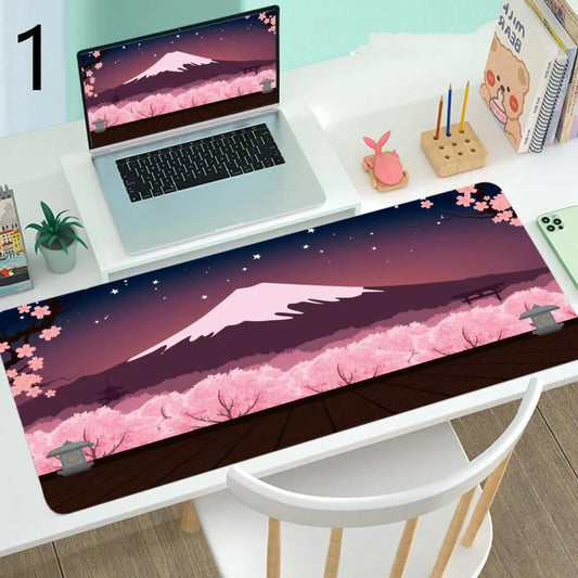 Large gaming mouse desk mat showing printed design on rubber surface with size options up to 400x900mm