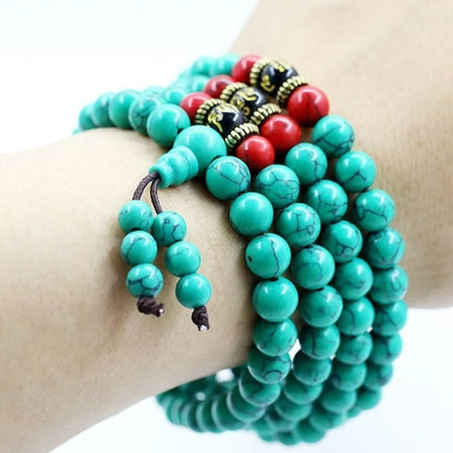 Turquoise Tibetan 108 beads bracelet with synthetic stone powder construction