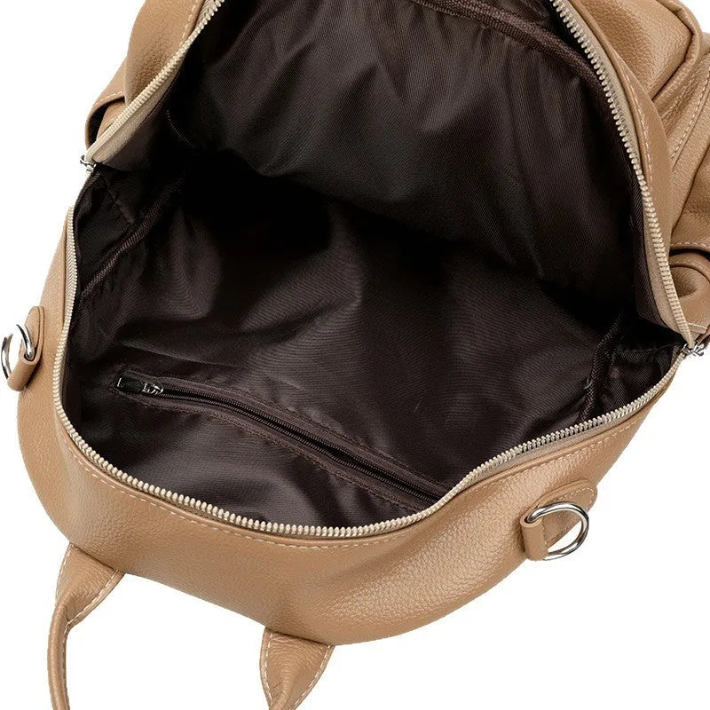 Genuine leather tassel backpack in khaki, black or brown with anti-theft pockets for casual travel
