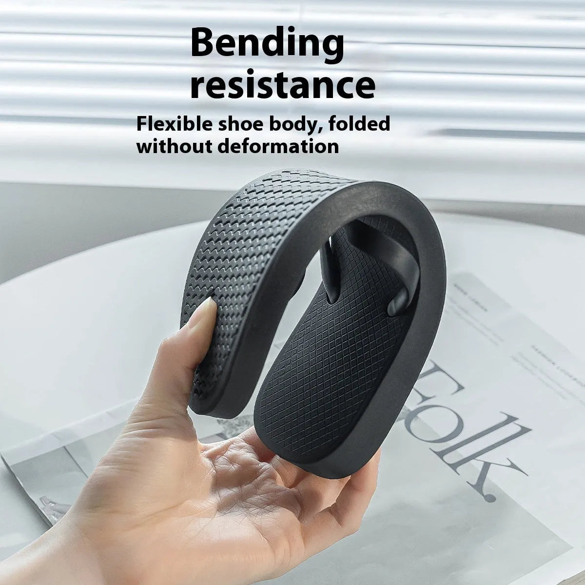 Foldable casual slippers with hollow-out plastic upper and non-slip PVC soles in black colour