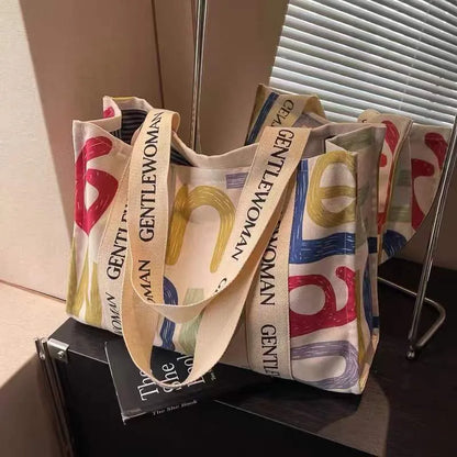 Canvas women's travel tote bag with printed patterns and shoulder straps