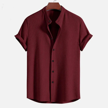 Men's loose short sleeve shirt in polyester, available in colours like wine red and navy blue, sizes S to 4XL