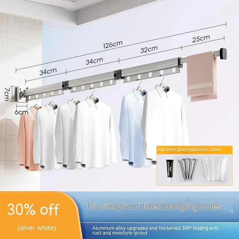 Aluminum retractable drying rack mounted on a window, extending outward for clothes drying
