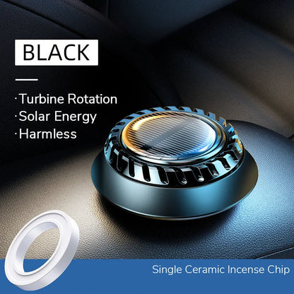 Solar-powered car aromatherapy diffuser with ceramic incense chip on dashboard