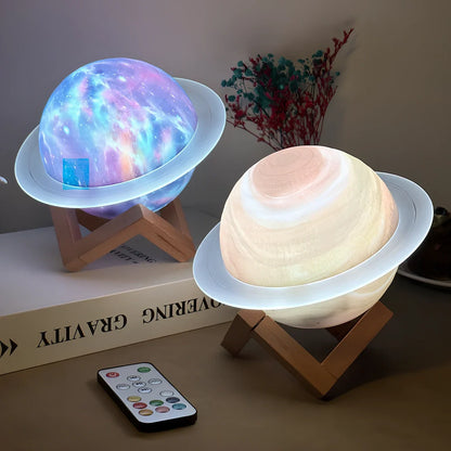 Rings of Saturn Dream Bluetooth Speaker showing 16.5cm dimensions with remote control and bracket accessories